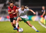 27 October 2023; Izzy Atkinson of Republic of Ireland in action against Mikaela Metalla of Albania during the UEFA Women's Nations League B match between Republic of Ireland and Albania at Tallaght Stadium in Dublin. Photo by Stephen McCarthy/Sportsfile