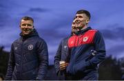27 October 2023; Joe Redmond of St Patrick's Athletic, right, with teammates Jamie Lennon, left, and goalkeeper Dean Lyness, behind, before the SSE Airtricity Men's Premier Division match between St Patrick's Athletic and Shamrock Rovers at Richmond Park in Dublin. Photo by Seb Daly/Sportsfile