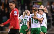 27 October 2023; Kyra Carusa of Republic of Ireland is congratulated by Abbie Larkin, after scoring her side's third goal during the UEFA Women's Nations League B match between Republic of Ireland and Albania at Tallaght Stadium in Dublin. Photo by Stephen McCarthy/Sportsfile