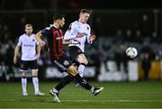 27 October 2023; Krystian Nowak of Bohemians in action against Cameron Elliott of Dundalk during the SSE Airtricity Men's Premier Division match between Dundalk and Bohemians at Oriel Park in Dundalk, Louth. Photo by Ben McShane/Sportsfile