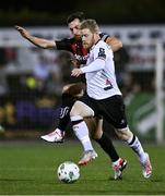 27 October 2023; Daryl Horgan of Dundalk in action against Jordan Flores of Bohemians during the SSE Airtricity Men's Premier Division match between Dundalk and Bohemians at Oriel Park in Dundalk, Louth. Photo by Ben McShane/Sportsfile