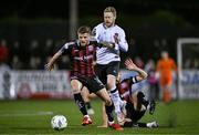 27 October 2023; Adam McDonnell of Bohemians in action against Daryl Horgan of Dundalk during the SSE Airtricity Men's Premier Division match between Dundalk and Bohemians at Oriel Park in Dundalk, Louth. Photo by Ben McShane/Sportsfile