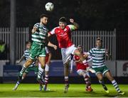 27 October 2023; Joe Redmond of St Patrick's Athletic in action against Roberto Lopes of Shamrock Rovers during the SSE Airtricity Men's Premier Division match between St Patrick's Athletic and Shamrock Rovers at Richmond Park in Dublin. Photo by Seb Daly/Sportsfile