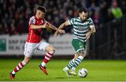 27 October 2023; Richie Towell of Shamrock Rovers in action against Adam Murphy of St Patrick's Athletic during the SSE Airtricity Men's Premier Division match between St Patrick's Athletic and Shamrock Rovers at Richmond Park in Dublin. Photo by Seb Daly/Sportsfile