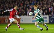 27 October 2023; Rory Gaffney of Shamrock Rovers in action against Jamie Lennon of St Patrick's Athletic during the SSE Airtricity Men's Premier Division match between St Patrick's Athletic and Shamrock Rovers at Richmond Park in Dublin. Photo by Seb Daly/Sportsfile