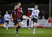 27 October 2023; Daryl Horgan of Dundalk is tackled by Krystian Nowak of Bohemians during the SSE Airtricity Men's Premier Division match between Dundalk and Bohemians at Oriel Park in Dundalk, Louth. Photo by Ben McShane/Sportsfile