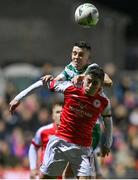 27 October 2023; Kian Leavy of St Patrick's Athletic in action against Gary O'Neill of Shamrock Rovers during the SSE Airtricity Men's Premier Division match between St Patrick's Athletic and Shamrock Rovers at Richmond Park in Dublin. Photo by Seb Daly/Sportsfile