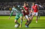 27 October 2023; Neil Farrugia of Shamrock Rovers in action against Anto Breslin of St Patrick's Athletic during the SSE Airtricity Men's Premier Division match between St Patrick's Athletic and Shamrock Rovers at Richmond Park in Dublin. Photo by Seb Daly/Sportsfile