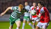 27 October 2023; Rory Gaffney of Shamrock Rovers in action against David Norman of St Patrick's Athletic during the SSE Airtricity Men's Premier Division match between St Patrick's Athletic and Shamrock Rovers at Richmond Park in Dublin. Photo by Seb Daly/Sportsfile