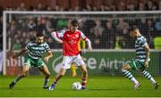 27 October 2023; Mason Melia of St Patrick's Athletic in action against Roberto Lopes, left, and Lee Grace of Shamrock Rovers during the SSE Airtricity Men's Premier Division match between St Patrick's Athletic and Shamrock Rovers at Richmond Park in Dublin. Photo by Seb Daly/Sportsfile