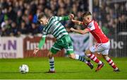 27 October 2023; Dylan Watts of Shamrock Rovers in action against Adam Murphy of St Patrick's Athletic during the SSE Airtricity Men's Premier Division match between St Patrick's Athletic and Shamrock Rovers at Richmond Park in Dublin. Photo by Seb Daly/Sportsfile