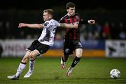 27 October 2023; Ali Coote of Bohemians gets past the tackle of Paul Doyle of Dundalk during the SSE Airtricity Men's Premier Division match between Dundalk and Bohemians at Oriel Park in Dundalk, Louth. Photo by Ben McShane/Sportsfile