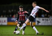 27 October 2023; Ali Coote of Bohemians in action against Paul Doyle of Dundalk during the SSE Airtricity Men's Premier Division match between Dundalk and Bohemians at Oriel Park in Dundalk, Louth. Photo by Ben McShane/Sportsfile