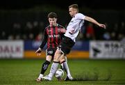 27 October 2023; Ali Coote of Bohemians in action against Paul Doyle of Dundalk during the SSE Airtricity Men's Premier Division match between Dundalk and Bohemians at Oriel Park in Dundalk, Louth. Photo by Ben McShane/Sportsfile