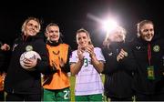 27 October 2023; Republic of Ireland players and backroom staff, from left, masseuse Hannah Tobin Jones, Saoirse Noonan, Chloe Mustaki, Amber Barrett and social media coordinator Emma Clinton, after the UEFA Women's Nations League B match between Republic of Ireland and Albania at Tallaght Stadium in Dublin. Photo by Stephen McCarthy/Sportsfile