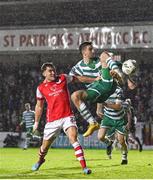 27 October 2023; Neil Farrugia of Shamrock Rovers shoots at goal under pressure from Anto Breslin of St Patrick's Athletic during the SSE Airtricity Men's Premier Division match between St Patrick's Athletic and Shamrock Rovers at Richmond Park in Dublin. Photo by Stephen McCarthy/Sportsfile