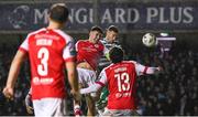 27 October 2023; Aaron Greene of Shamrock Rovers heads his side's first goal under pressure from Joe Redmond of St Patrick's Athletic during the SSE Airtricity Men's Premier Division match between St Patrick's Athletic and Shamrock Rovers at Richmond Park in Dublin. Photo by Stephen McCarthy/Sportsfile