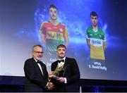 27 October 2023; James Doyle of Carlow receives his 2023 McDonagh Cup Team of the Year award from Uachtarán Chumann Lúthchleas Gael Larry McCarthy during the GAA Champion 15 Awards Croke Park in Dublin. Photo by Matt Browne/Sportsfile