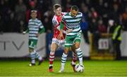 27 October 2023; Graham Burke of Shamrock Rovers in action against Ben McCormack of St Patrick's Athletic during the SSE Airtricity Men's Premier Division match between St Patrick's Athletic and Shamrock Rovers at Richmond Park in Dublin. Photo by Seb Daly/Sportsfile