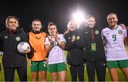 27 October 2023; Republic of Ireland players and staff, from left, masseuse Hannah Tobin Jones, Saoirse Noonan, Chloe Mustaki, Amber Barrett, social media coordinator Emma Clinton and Erin McLaughlin after the UEFA Women's Nations League B match between Republic of Ireland and Albania at Tallaght Stadium in Dublin. Photo by Stephen McCarthy/Sportsfile