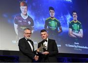 27 October 2023; Jack Regan of Meath receives his 2023 Ring, Rackard, and Meagher Team of the Year award from Uachtarán Chumann Lúthchleas Gael Larry McCarthy during the GAA Champion 15 Awards Croke Park in Dublin. Photo by Matt Browne/Sportsfile