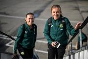 28 October 2023; Grace Moloney, right, and Katie McCabe of Republic of Ireland at Dublin Airport ahead of the team's departure to Albania for their UEFA Women's Nations League match against Albania, on Tuesday. Photo by Stephen McCarthy/Sportsfile