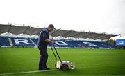 28 October 2023; Groundsman Gary O'Neill paints the pitch lines before the United Rugby Championship match between Leinster and Hollywoodbets Sharks at the RDS Arena in Dublin. Photo by Harry Murphy/Sportsfile
