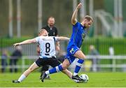 28 October 2023; Rowan McDonald of Waterford in action against Aaron Connolly of Athlone Town during the SSE Airtricity Men's First Division Play-Off semi-final second leg match between Waterford and Athlone Town at the RSC in Waterford. Photo by Seb Daly/Sportsfile