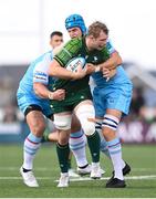 28 October 2023; Niall Murray of Connacht is tackled by Oli Kebble, left, and Scott Cummings of Glasgow Warriors during the United Rugby Championship match between Connacht and Glasgow Warriors at The Sportsground in Galway. Photo by Ramsey Cardy/Sportsfile