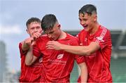 28 October 2023; Josh Lyons of Shelbourne, centre, celebrates with team-mate James Bailey, right, and Dan Ring after scoring their side's firat goal during the EA SPORTS MU17 LOI Mark Farren Cup match between Shamrock Rovers and Shelbourne at Tallaght Stadium in Dublin. Photo by Tyler Miller/Sportsfile