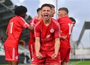 28 October 2023; Leo Healy of Shelbourne celebrates after team-mate Josh Lyons of Shelbourne scores their side's first goal during the EA SPORTS MU17 LOI Mark Farren Cup match between Shamrock Rovers and Shelbourne at Tallaght Stadium in Dublin. Photo by Tyler Miller/Sportsfile