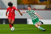 28 October 2023; Mark Isong of Shelbourne in action against Barry Kealy of Shamrock Rovers during the EA SPORTS MU17 LOI Mark Farren Cup match between Shamrock Rovers and Shelbourne at Tallaght Stadium in Dublin. Photo by Tyler Miller/Sportsfile