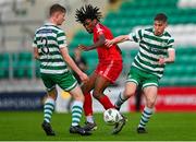 28 October 2023; Mark Isong of Shelbourne in action against James Stefan Roche of Shamrock Rovers, right, and Barry Keal during the EA SPORTS MU17 LOI Mark Farren Cup match between Shamrock Rovers and Shelbourne at Tallaght Stadium in Dublin. Photo by Tyler Miller/Sportsfile