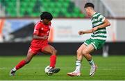 28 October 2023; Mark Isong of Shelbourne in action against Richard Vodo of Shamrock Rovers during the EA SPORTS MU17 LOI Mark Farren Cup match between Shamrock Rovers and Shelbourne at Tallaght Stadium in Dublin. Photo by Tyler Miller/Sportsfile