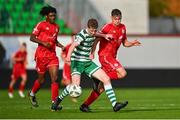 28 October 2023; Barry Kealy of Shamrock Rovers in action against Mark Isong of Shelbourne, left, and Dan Ring during the EA SPORTS MU17 LOI Mark Farren Cup match between Shamrock Rovers and Shelbourne at Tallaght Stadium in Dublin. Photo by Tyler Miller/Sportsfile