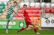 28 October 2023; Cian Dillon of Shamrock Rovers has a shot blocked by Ivan Graminschii of Shelbourne during the EA SPORTS MU17 LOI Mark Farren Cup match between Shamrock Rovers and Shelbourne at Tallaght Stadium in Dublin. Photo by Tyler Miller/Sportsfile