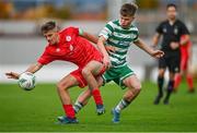 28 October 2023; Aaron Maloney of Shelbourne in action against Ryan Ritchie of Shamrock Rovers during the EA SPORTS MU17 LOI Mark Farren Cup match between Shamrock Rovers and Shelbourne at Tallaght Stadium in Dublin. Photo by Tyler Miller/Sportsfile