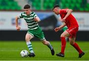 28 October 2023; Sean Moore of Shamrock Rovers in action against Josh Lyons of Shelbourne during the EA SPORTS MU17 LOI Mark Farren Cup match between Shamrock Rovers and Shelbourne at Tallaght Stadium in Dublin. Photo by Tyler Miller/Sportsfile