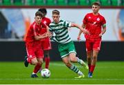 28 October 2023; Tristian Donnelly of Shamrock Rovers in action against Corman O'Donoghue of Shelbourne during the EA SPORTS MU17 LOI Mark Farren Cup match between Shamrock Rovers and Shelbourne at Tallaght Stadium in Dublin. Photo by Tyler Miller/Sportsfile