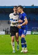 28 October 2023; Oisin Duffy of Athlone Town, left, and Connor Parsons of Waterford after the SSE Airtricity Men's First Division Play-Off semi-final second leg match between Waterford and Athlone Town at the RSC in Waterford. Photo by Seb Daly/Sportsfile