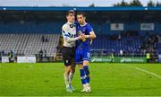 28 October 2023; Oisin Duffy of Athlone Town, left, and Connor Parsons of Waterford after the SSE Airtricity Men's First Division Play-Off semi-final second leg match between Waterford and Athlone Town at the RSC in Waterford. Photo by Seb Daly/Sportsfile