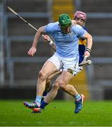 28 October 2023; Mike Foley of Na Piarsaigh in action against Tom O'Brien of Patrickswell during the Limerick County Senior Club Hurling Championship final between Na Piarsaigh and Patrickswell at the TUS Gaelic Grounds in Limerick. Photo by Piaras Ó Mídheach/Sportsfile