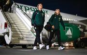 28 October 2023; Kyra Carusa, left, and Emily Whelan of Republic of Ireland at Tirana International Airport following their charted flight from Dublin for their UEFA Women's Nations League match against Albania, on Tuesday. Photo by Stephen McCarthy/Sportsfile