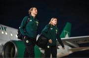 28 October 2023; Kyra Carusa, left, and Emily Whelan of Republic of Ireland at Tirana International Airport following their charted flight from Dublin for their UEFA Women's Nations League match against Albania, on Tuesday. Photo by Stephen McCarthy/Sportsfile