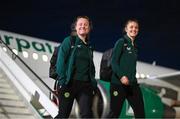 28 October 2023; Amber Barrett and Caitlin Hayes, right, of Republic of Ireland at Tirana International Airport following their charted flight from Dublin for their UEFA Women's Nations League match against Albania, on Tuesday. Photo by Stephen McCarthy/Sportsfile