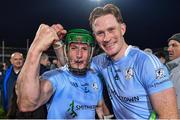 28 October 2023; Na Piarsaigh players Mike Foley, left, and William O'Donoghue celebrate after their side's victory in the Limerick County Senior Club Hurling Championship final between Na Piarsaigh and Patrickswell at the TUS Gaelic Grounds in Limerick. Photo by Piaras Ó Mídheach/Sportsfile
