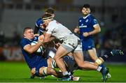 28 October 2023; Scott Penny of Leinster is tackled by Dylan Richardson, hidden, and James Venter of Hollywoodbets Sharks during the United Rugby Championship match between Leinster and Hollywoodbets Sharks at the RDS Arena in Dublin. Photo by Sam Barnes/Sportsfile