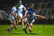 28 October 2023; Mike Casey of Na Piarsaigh in action against John Flynn of Patrickswell during the Limerick County Senior Club Hurling Championship final between Na Piarsaigh and Patrickswell at the TUS Gaelic Grounds in Limerick. Photo by Stephen Marken/Sportsfile