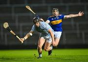28 October 2023; Peter Casey of Na Piarsaigh in action against Kevin O'Brien of Patrickswell during the Limerick County Senior Club Hurling Championship final between Na Piarsaigh and Patrickswell at the TUS Gaelic Grounds in Limerick. Photo by Piaras Ó Mídheach/Sportsfile
