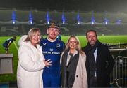 28 October 2023; Dylan Donnellan of Leinster with, from left, mother Deidre D'Arcy, partner Gemma Morris and father Paul Donnellan after making his Leinster debut in the United Rugby Championship match between Leinster and Hollywoodbets Sharks at the RDS Arena in Dublin. Photo by Harry Murphy/Sportsfile